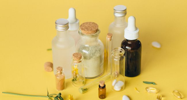 Various bottles and vials representing substances, illustrating an overview of the most common drugs used by teens, highlighting the importance of awareness and prevention in Arizona in 2024.