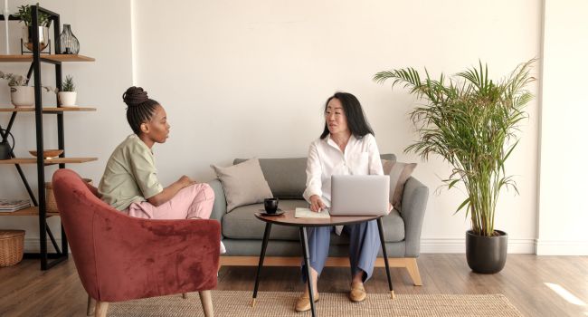 Therapist engaging in a one-on-one session with a teen, illustrating the personalized approach of individual therapy, focusing on the teen's unique needs and providing tailored support.