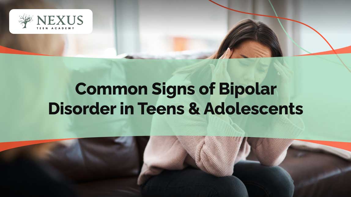 A distressed teenage girl holding her head in her hands, symbolizing emotional challenges, mood swings, and potential signs of bipolar disorder in teens.