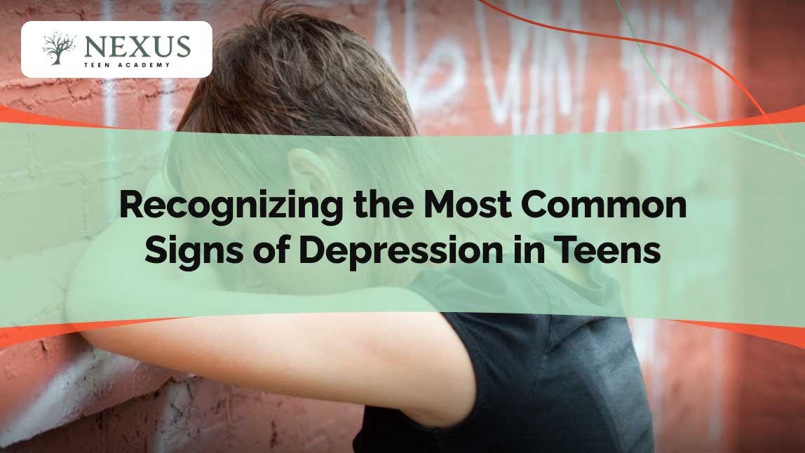 Image of a teen leaning against a graffiti wall, appearing distressed, symbolizing emotional struggles. Alt text: Recognizing the Most Common Signs of Depression in Teens, highlighting key indicators.