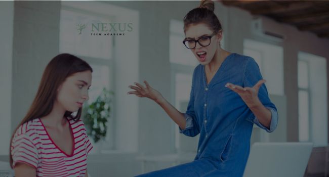 A frustrated mother argues while her teen daughter looks away, avoiding conflict. Anger management helps teens develop emotional control, improve communication, and build healthier relationships.