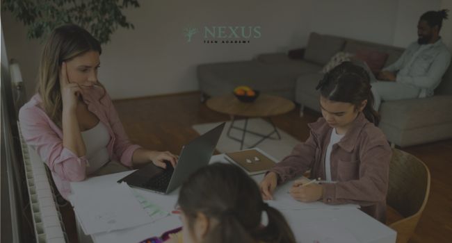 A mother works on her laptop while observing her children doing homework. Parents play a key role in teen anger management by fostering open communication, setting boundaries, and modeling calm behavior.