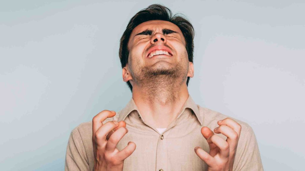 A frustrated teen expressing anger, highlighting the need for structured anger management programs at Nexus Teen Academy to develop healthy emotional regulation skills.