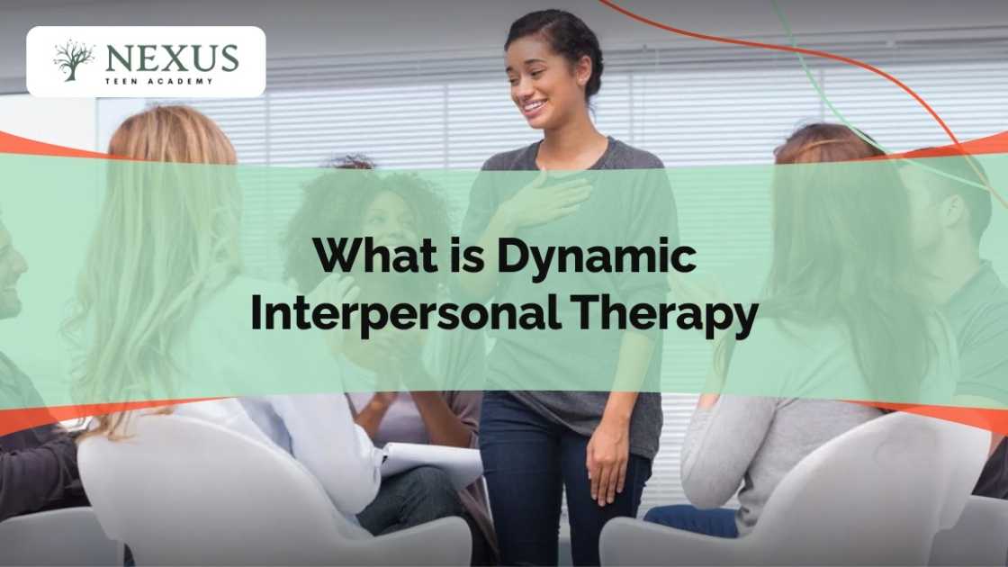 A smiling woman speaks to a supportive therapy group, with the title “What is Dynamic Interpersonal Therapy?” overlayed, representing group-based emotional and interpersonal treatment.